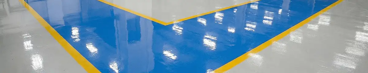 A factory floor professionally covered and marked with epoxy flooring in Oklahoma City, OK