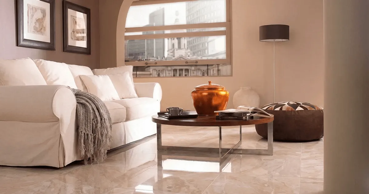 Modern living room with professionally installed marble flooring, a beige sofa, coffee table in Oklahoma City, OK