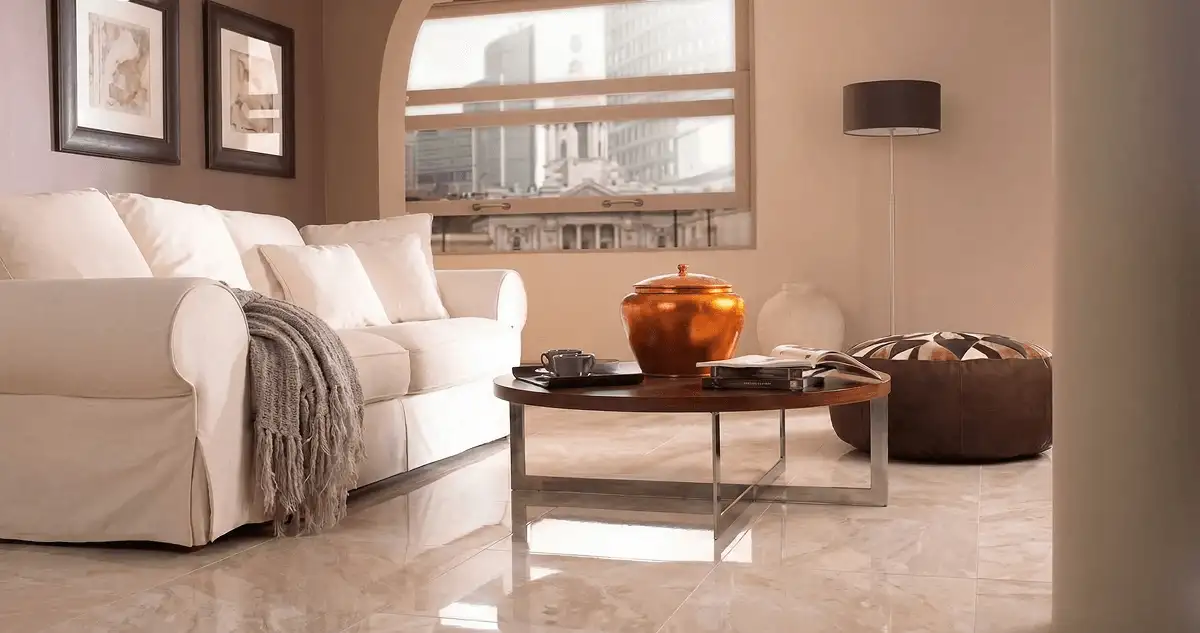 Modern living room with professionally installed marble flooring, a beige sofa, coffee table in Oklahoma City, OK
