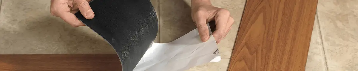 A professional installing vinyl flooring in Oklahoma City, OK