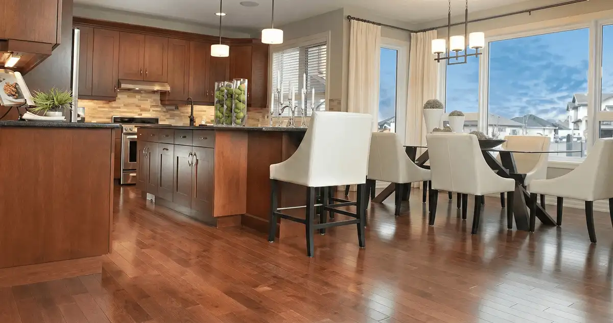A modern kitchen with professionally installed wood flooring in Oklahoma City, OK